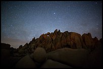 Geometrically shaped rocks and clear starry sky. Joshua Tree National Park, California, USA.