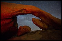 Arch Rock and night sky with Milky Way. Joshua Tree National Park, California, USA.