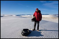 Photographer holding large format camera. White Sands National Park ( color)