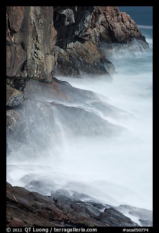 Blurred water at base of Great Head. Acadia National Park, Maine, USA.