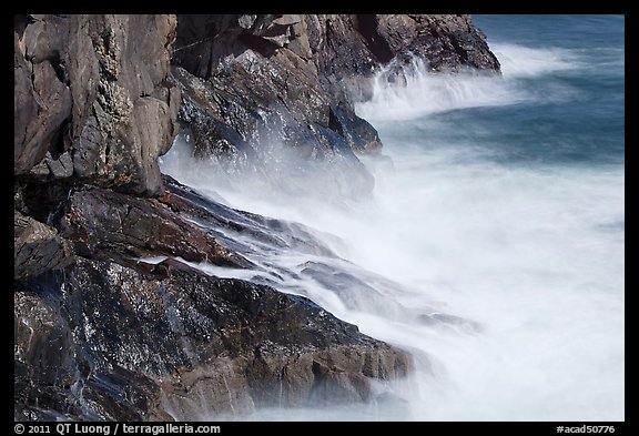 Fog-like water from long exposure at base of cliff. Acadia National Park, Maine, USA.