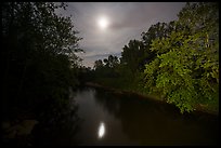 Cuyahoga River and moon at night. Cuyahoga Valley National Park, Ohio, USA.