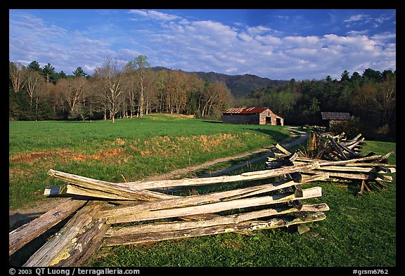 Wooden fence, pasture, and cabin, late afternoon, Cades Cove, Tennessee. Great Smoky Mountains National Park, USA.
