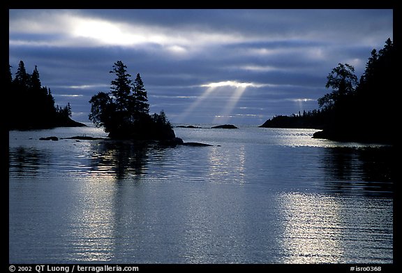 Sunrays and islet,  Chippewa harbor. Isle Royale National Park, Michigan, USA.