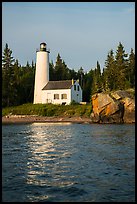 Rock Harbor Lighthouse and reflection. Isle Royale National Park, Michigan, USA.
