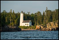 Rocks and Rock Harbor Lighthouse. Isle Royale National Park, Michigan, USA.
