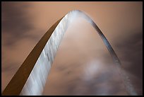Gateway Arch and clouds at night. Gateway Arch National Park, St Louis, Missouri, USA.
