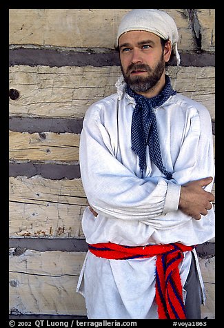 Park staff wearing white period outfit similar to that worn by  Voyageurs. Voyageurs National Park, Minnesota, USA.