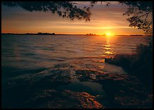 Sun rising over Kabetogama Lake. Voyageurs National Park, Minnesota, USA. (color)