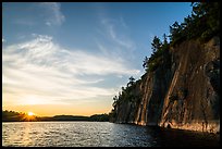 Sun setting and Grassy Bay Cliffs at sunset. Voyageurs National Park ( color)