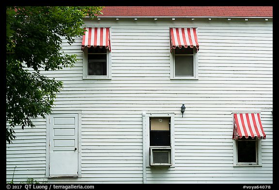 Kettle Falls Hotel wall with with red and white stripes awnings. Voyageurs National Park (color)