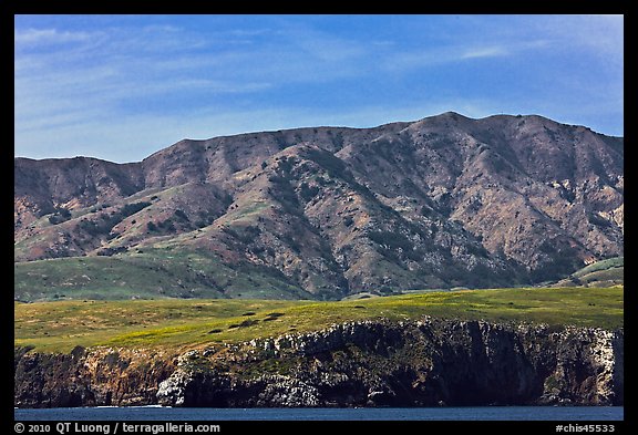 Tall hill ridge and cliff seen from ocean, Santa Cruz Island. Channel Islands National Park, California, USA.