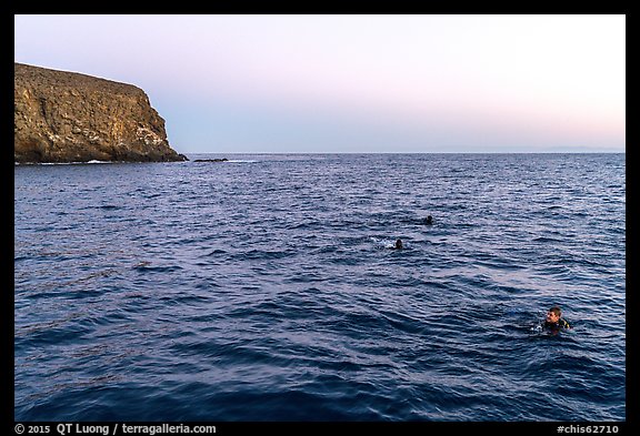 Divers surface at dawn, Santa Barbara Island. Channel Islands National Park, California, USA.