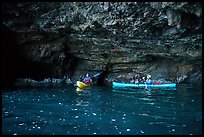 Two kayakers in sea cave with low ceiling, Santa Cruz Island. Channel Islands National Park ( color)
