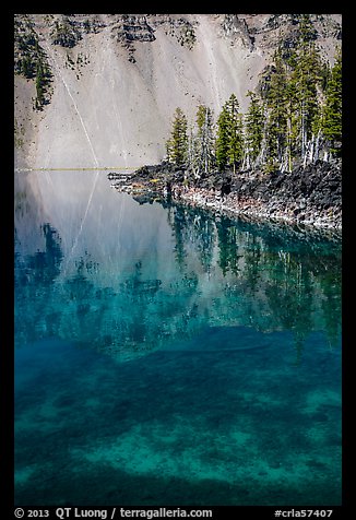 Watchman reflection in clear water of Fumarole Bay, Wizard Island. Crater Lake National Park (color)