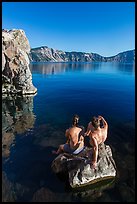 Men sunning on rock, Cleetwood Cove. Crater Lake National Park ( color)