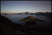 Wizard Island and lake with moonlight. Crater Lake National Park, Oregon, USA.