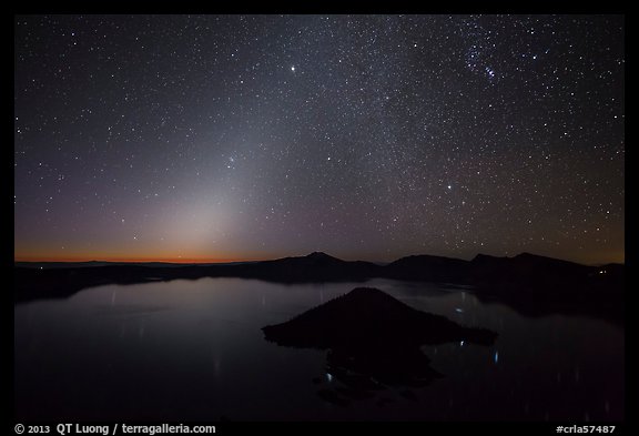 Glow from dawn and starry sky. Crater Lake National Park, Oregon, USA.