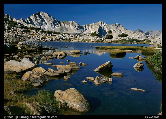 Mt Giraud reflected in a lake in Dusy Basin, morning. Kings Canyon National Park, California, USA.
