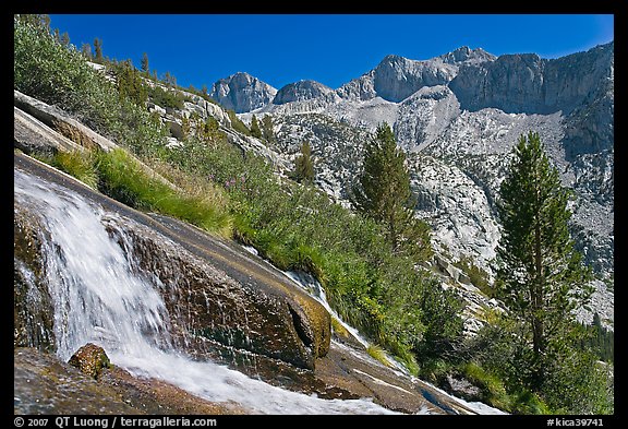 Waterfall, and mountains, Le Conte Canyon. Kings Canyon National Park, California, USA.