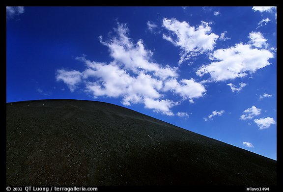 Smooth cinder cone profile and clouds. Lassen Volcanic National Park (color)