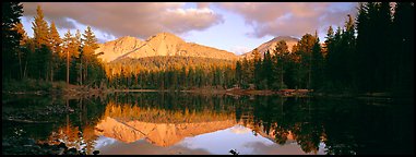 Chaos Crags reflected in lake at sunset. Lassen Volcanic National Park, California, USA.