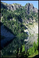 Cliffs reflected in Eunice Lake. Mount Rainier National Park, Washington, USA.