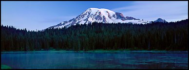 Lake, forest, and Mount Rainer at dawn. Mount Rainier National Park, Washington, USA.