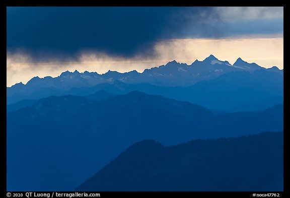 Storm clouds over layered ridges, North Cascades National Park. Washington, USA.