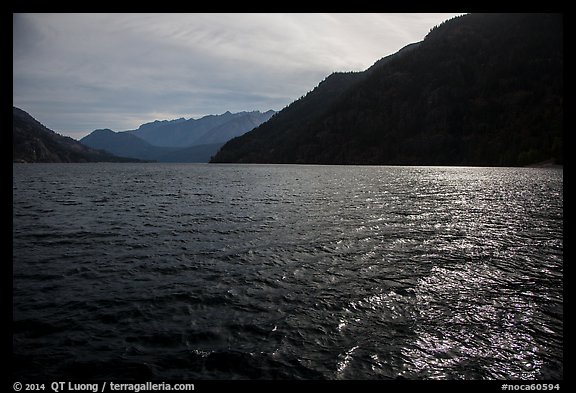 Sun shimmering in Lake Chelan waters, North Cascades National Park Service Complex. Washington, USA.