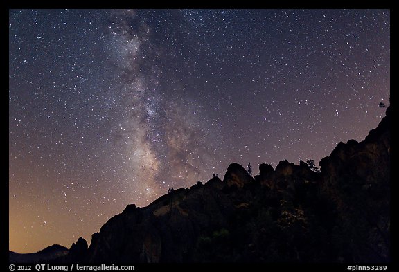 Rocky ridge and star-filled sky with Milky Way. Pinnacles National Park, California, USA.