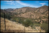 Boundary fence along steep hill. Pinnacles National Park, California, USA. (color)