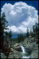 Yosemite Creek and summer afternoon thunderstorm cloud. Yosemite National Park, California, USA.