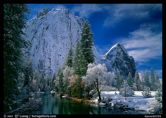 Cathedral rocks and Merced River with fresh snow. Yosemite National Park, California, USA.