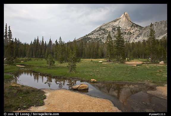 Stream, meadow, and Cathedral Peak, afternoon. Yosemite National Park, California, USA.