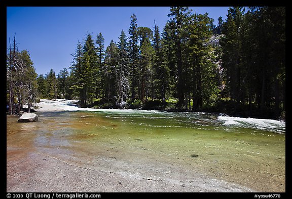 Merced River flowing over smooth granite. Yosemite National Park, California, USA.