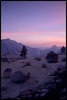 Glacial erratics, pine trees, Clouds rest and Half-Dome from Olmstedt Point, sunset. Yosemite National Park, California, USA. (color)