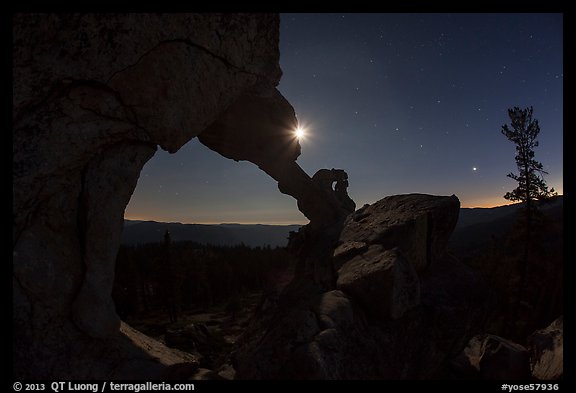 Moon and Indian Arch at night. Yosemite National Park, California, USA.