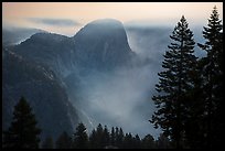 Liberty cap and smoke at night. Yosemite National Park, California, USA.