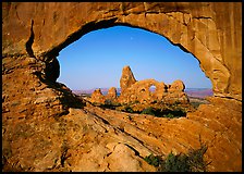 Turret Arch seen from rock opening. Arches National Park, Utah, USA.