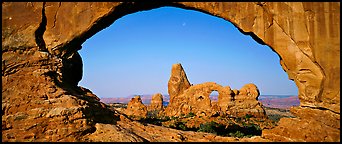 Turret Arch through slickrock window. Arches National Park (Panoramic color)