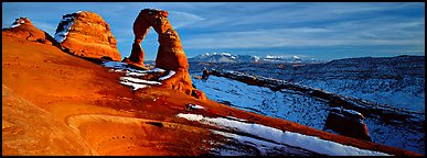 Delicate Arch and snowy mountain. Arches National Park (Panoramic color)