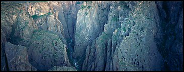 Startling depths and narrow opening of Black Canyon. Black Canyon of the Gunnison National Park (Panoramic color)