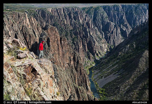 Park visitor looking, Pulpit rock overlook. Black Canyon of the Gunnison National Park, Colorado, USA.