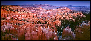 Innumerable brighly colored free-standing hoodoos aligned in amphiteater. Bryce Canyon National Park, Utah, USA.