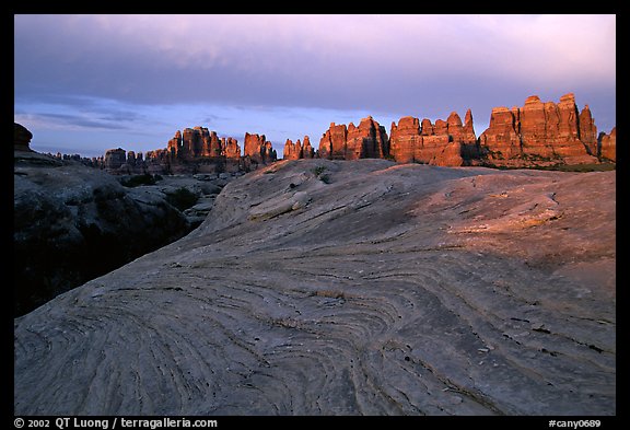 Sandstone swirls and Needles near Elephant Hill,  sunset. Canyonlands National Park