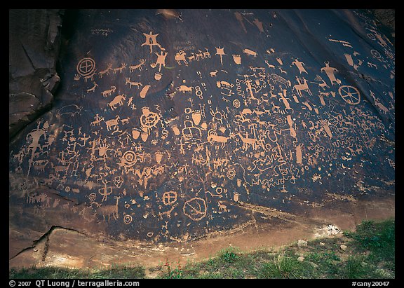 Slab called Newspaper Rock covered with petroglyphs. Utah, USA (color)