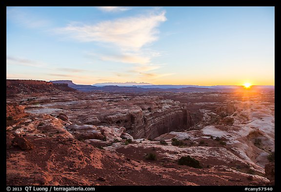 Sunrise over Jasper Canyon from Petes Mesa. Canyonlands National Park, Utah, USA.