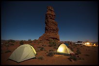 Camp at the base of Standing Rock at night. Canyonlands National Park, Utah, USA. (color)