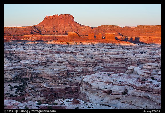 Chocolate drops, Maze canyons, and Elaterite Butte at sunrise. Canyonlands National Park, Utah, USA.